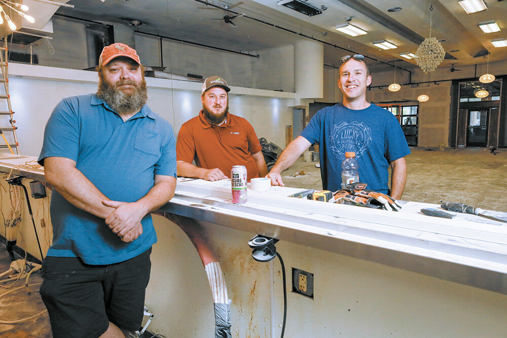DOWNTOWN ADDITION: From left, Collin Saddler, Matt Faucett and Levi Grant are among owners of Bigg Time Arcade, which is expected to open this summer at 301 Park Central East.